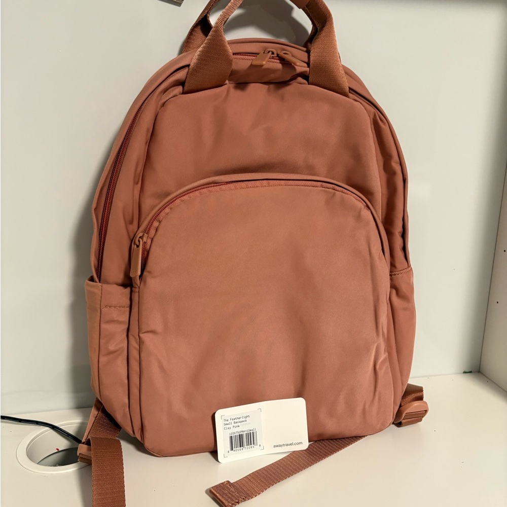 Away Featherlight Backpack in Clay Pink - Small